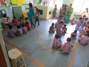 I love the painted circles on the floor: there's a large one for whole-group gatherings and little ones for small group work.